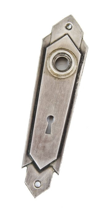 original late 1920's american art deco "skyscraper" style pressed or stamped steel residential doorknob backplate with black enameled accent