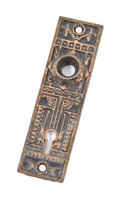 new old stock late 19th century ornamental cast iron interior residential doorknob backplate with uniform brass plated finish