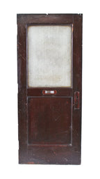 c. 1895 oversized interior varnished mahogany wood reliance office building single recessed panel door with intact textured glass pane