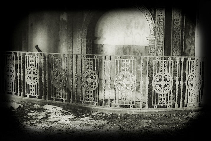 original and intact late 1920's american antique black enameled ornamental cast iron spanish revival style sheridan theater interior lobby staircase baluster panel