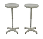 matching pair of original c. 1950's fully operable gunship gray enameled telescoping factory "adjustrite" stationary stools