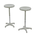 pair of original mid-century fully functional four-legged tubular steel gray enameled adjustable height stationary factory stools