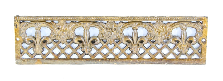 late 19th century victorian era ornamental gold enameled cast iron fireplace gas insert replacement grille with fleur-de-lis design motif