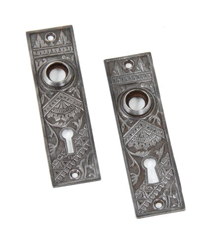 matching set of original c. 1880's eastlake style ornamental cast iron "oriental" pattern interior residential passage door backplates