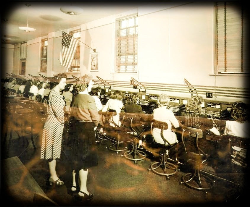 one of two nearly identical american depression era telephone company switchboard chairs or stools with adjustable height seat and curvaceous four-legged base
