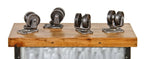 lot of four matching original and functional reinforced american industrial refinished iron and steel "roll ezy chief" swivel casters