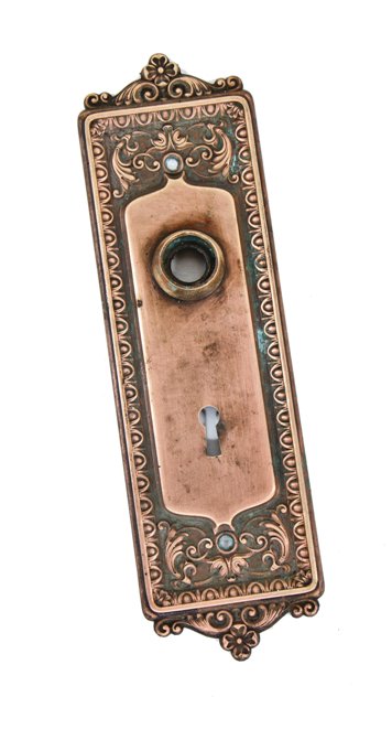 c. 1900's original ornamental interior residential stamped wrought bronze "mantua" pattern doorknob backplate with intact thimble