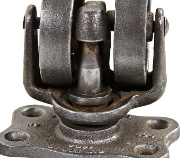 group four of early 1930's original and fully functional refinished iron and steel "roll-ezy chief" double wheel factory truck casters