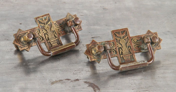 matching set of original c. 1880's eastlake style ornamental cast brass furniture drawer pull handles with potted plants
