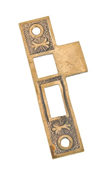 single 19th century antique american ornamental cast brass interior residential passage door strike plate with abstract floral motifs