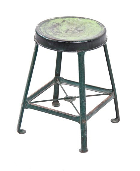 original and intact low-lying green enameled pressed and folded "royal chicago" steel four-legged stool with ball-turned feet