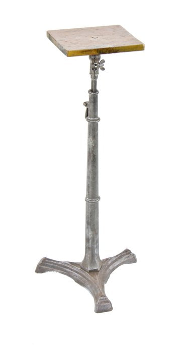 early 20th century american industrial refinished three-legged cast iron telescoping "magician stand" with tapered and turned base