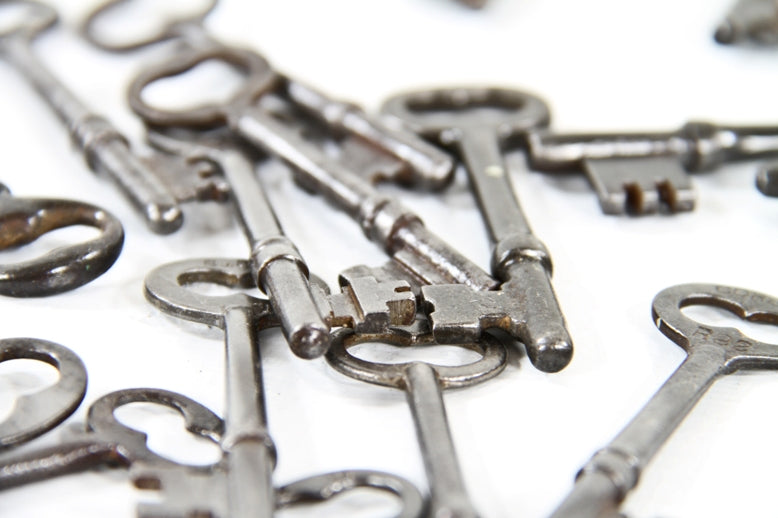 variety of original antique american residential stamped steel mortise lock skeleton keys with lightly incised manufacturer markings