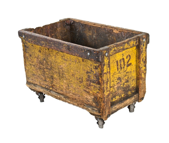 ragged and worn c. 1940's american industrial mobile painted wood factory scrap metal mobile cart or bin or fully functional bassick steel casters