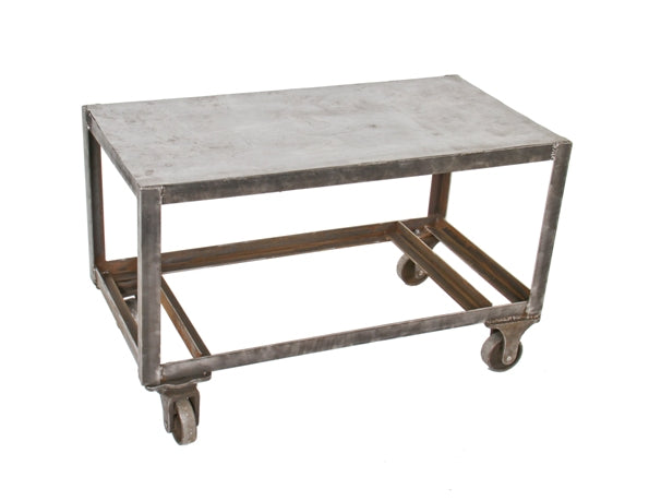 original custom-built late 1940's reinforced heavy gauge all-welded brushed steel factory welding table with intact steel stationary and swivel casters