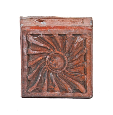 unique 19th century american victorian era red glazed terra cotta exterior residential ornamental block featuring a sunburst swirl design motif