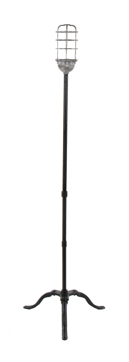 repurposed c. 1920's american industrial freestanding theater stage illuminated "ghost light" with three-legged riveted iron base