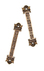 two matching original american eastlake style "ivy" pattern ornamental cast brass residential window sash pulls with ivy leaf field pattern