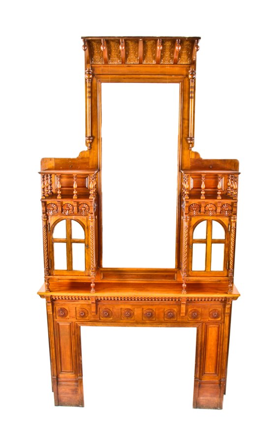 original extraordinary 19th century american hand-crafted david c. cook mansion cherry wood fireplace mantel featuring segmented beveled mirror hinged door cabinets