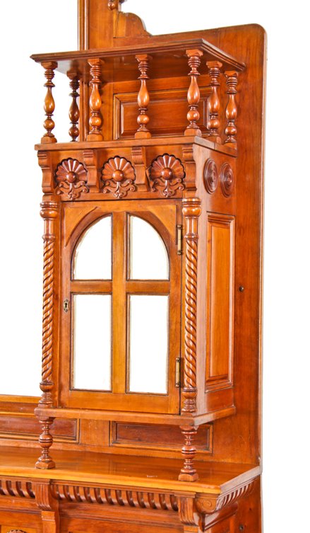 original extraordinary 19th century american hand-crafted david c. cook mansion cherry wood fireplace mantel featuring segmented beveled mirror hinged door cabinets