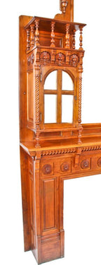 original extraordinary 19th century american hand-crafted david c. cook mansion cherry wood fireplace mantel featuring segmented beveled mirror hinged door cabinets