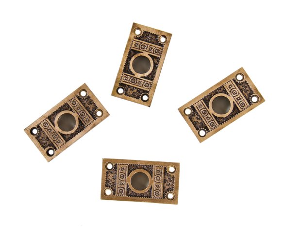 four matching original 19th century american eastlake style "ivy" pattern ornamental cast brass flushmount residential window sash pull plates