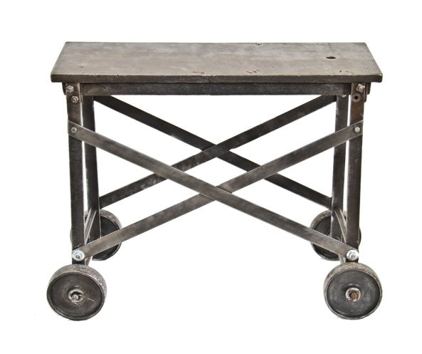 heavily reinforced vintage american industrial refinished iron and steel factory glass blower's work table with original solid steel rollers