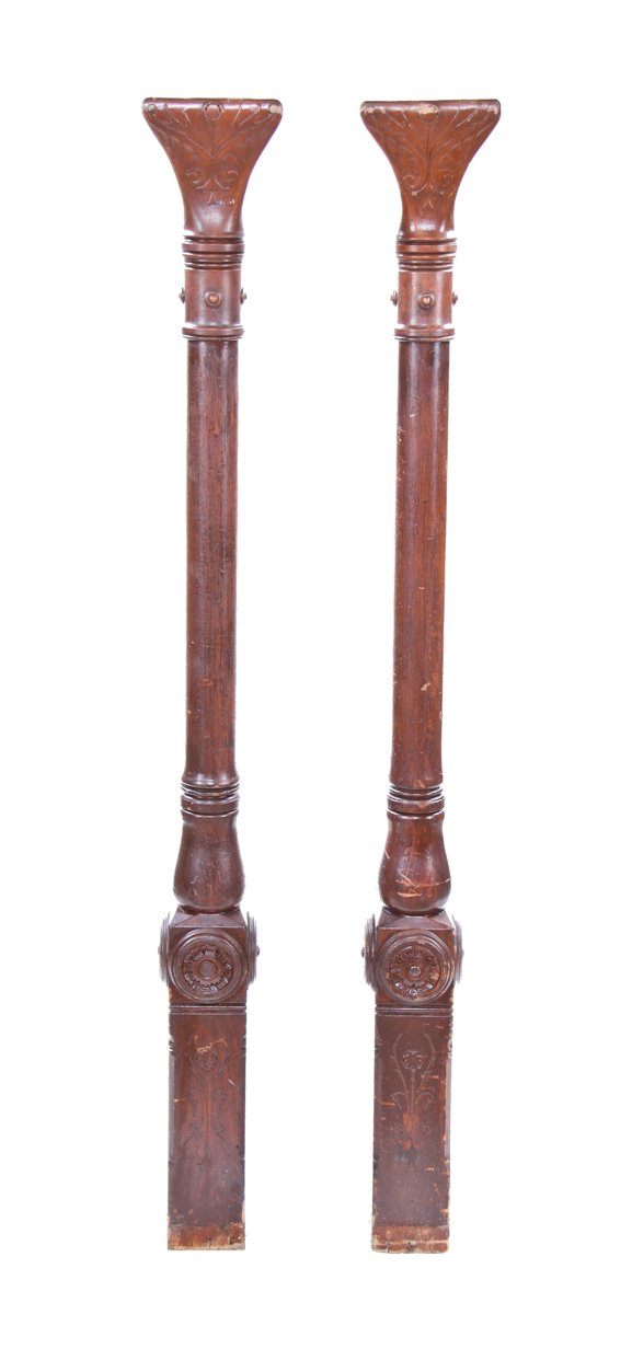 matching pair of skillfully crafted c. 1886 american victorian era solid cherry wood interior room divider or colonnade columns with impressive carved ornament