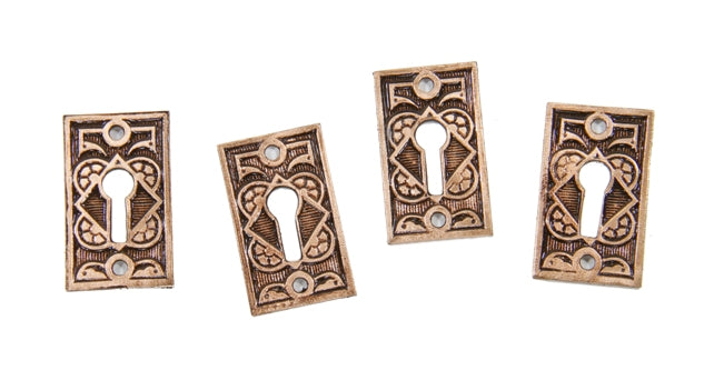 four matching c. 1885 antique american interior residential ornamental cast brass passage door keyhole escutcheons or keyplates