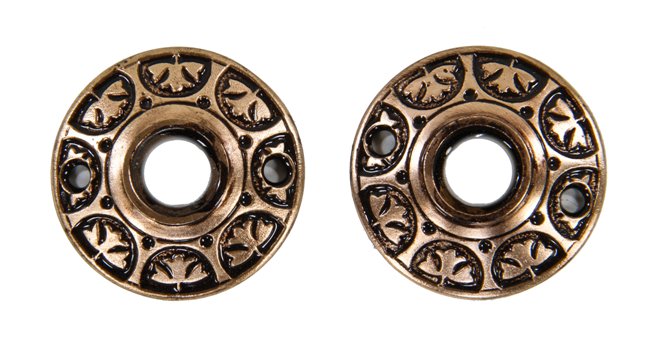 two matching original 19th century fanciful american cast brass metal interior residential circular doorknob rosettes with black enameled inlay