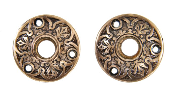 two matching c. 1880's american ornamental cast brass victorian era interior residential doorknob rosettes with repeating palmette motif