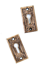 two matching 19th century antique american ornamental cast brass flush mount "bamboo" pattern interior passage door keyhole escutcheons
