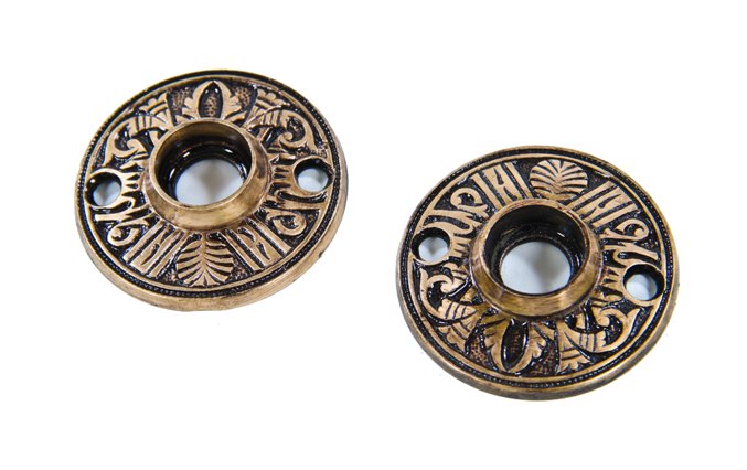 identical 19th century american eastlake style decorative cast brass "egyptian" pattern interior residential doorknob rosettes with enameled inlay