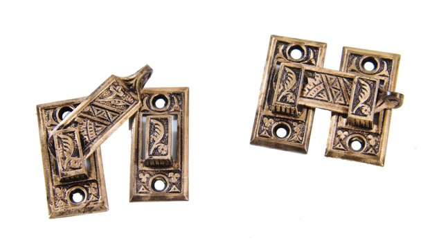 matching set of original eastlake style 19th century american antique "oriental" pattern interior residential window shutter door latches comprised of brass