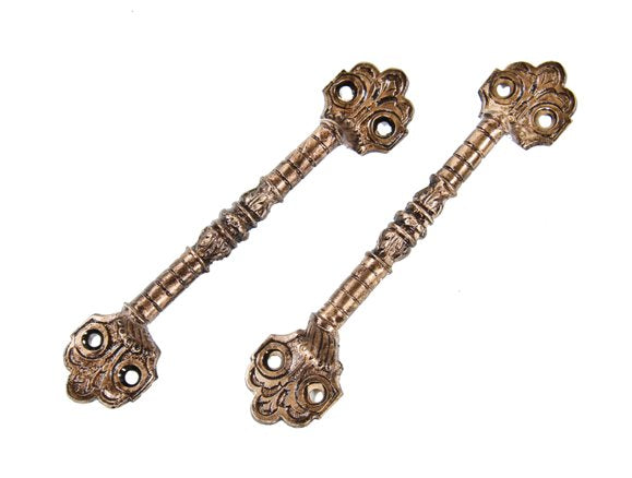 matching set of all original american victorian era c. 1880's ornamental cast brass interior residential finely turned window sash pulls
