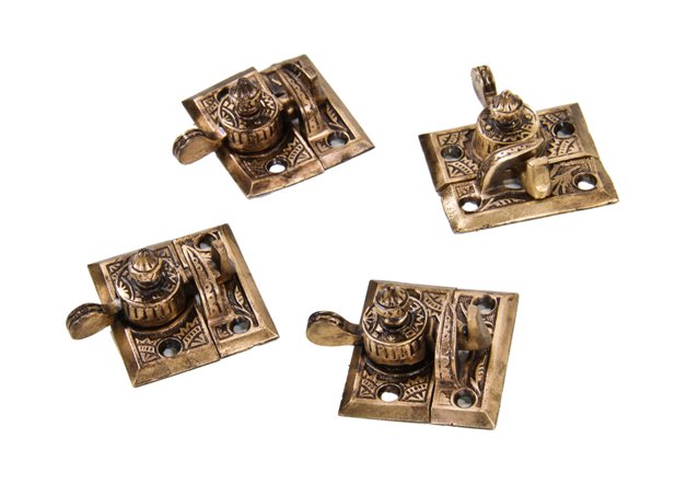 lot of four matching original 19th century american eastlake style ornamental cast brass "oriental" pattern residential window sash locks
