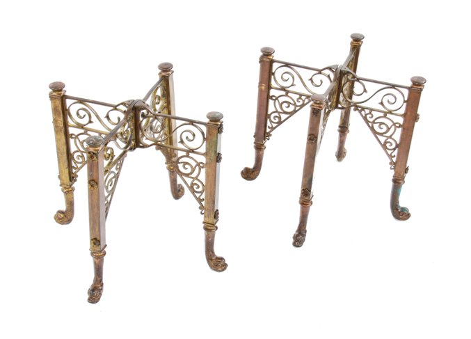 matching set of early 20th century american ornamental brass collapsible funeral home coffin or casket stands with mythical creature feet