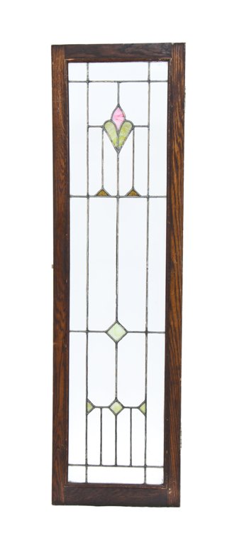 single early 20th century american craftsman style leaded glass residential cabinet door accentuated with art glass diamonds and floral motif