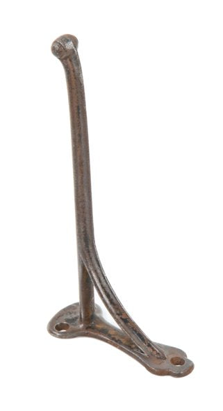 early 20th century antique american industrial oversized wall-mount cast iron harness or tack hook with traces of the original black paint finish