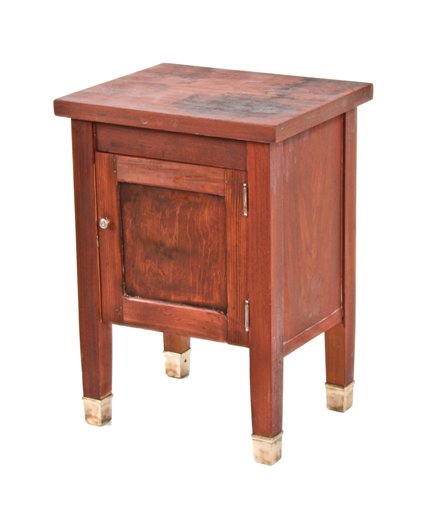 original solidly built c. 1920's american industrial mahogany wood factory office storage cabinet with single swing-out door and bronze "shoes"