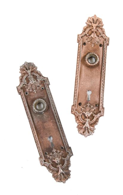 matching pair of original early 20th century american ornamental cast iron "ontario" pattern passage door backplates or escutcheons