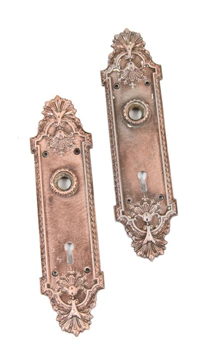 two matching original c. 1900's american antique ornamental "ontario" pattern copper-plated cast iron doorknob backplates or escutcheons