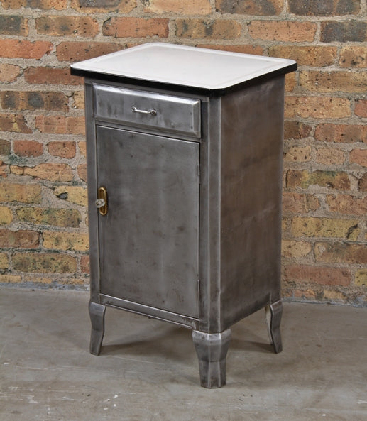 refinished c. 1920's american vintage medical cold-rolled pressed and folded sheet steel hospital room supply cabinet with white porcelain enameled detachable tabletop