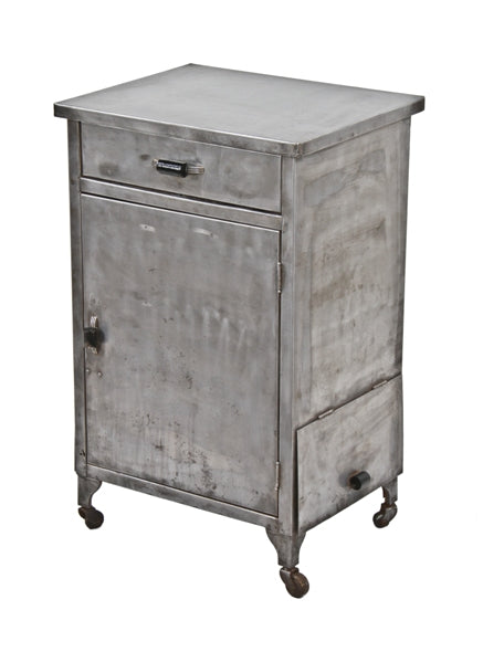 american art deco c. 1920's machine age pressed and folded refinished steel mobile medical supply cabinet with unique streamlined handles
