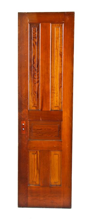 well-maintained c. 1910 american interior residential varnished yellow pine wood closet door with five raised panel configuration