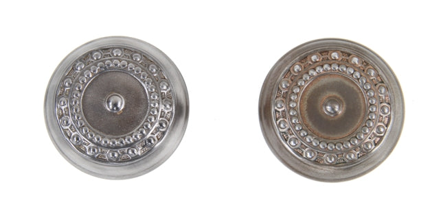 pair of c. 1900's american ornamental wrought steel interior residential banded rim "como" pattern passage size doorknobs