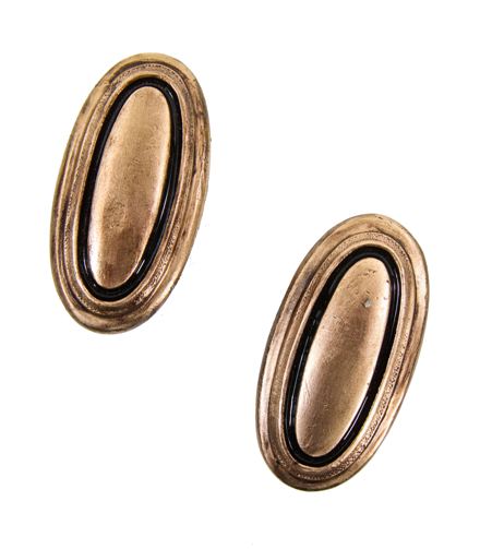 matching set of c. 1920's american interior chicago apartment building oval-shaped french door handles comprised of unornamented cast bronze