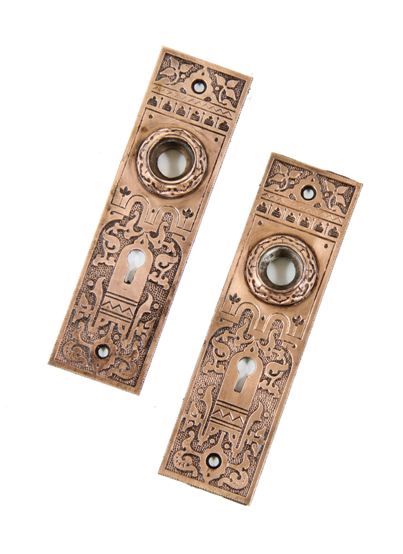 two matching c. 1880's american antique victorian era ornamental cast bronze interior residential doorknob escutcheons or backplates