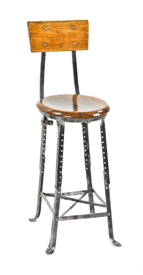 late 1920's refinished vintage american industrial four-legged angled steel adjustable height factory stool with original maple wood seat and backrest