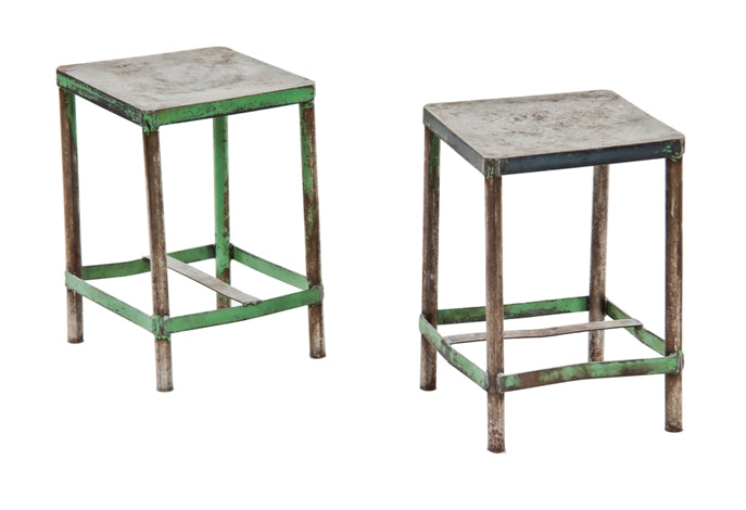 matching set of early 1920's american industrial low-lying all-welded heavy gauge steel factory machine shop stands or stools with distressed green paint finish